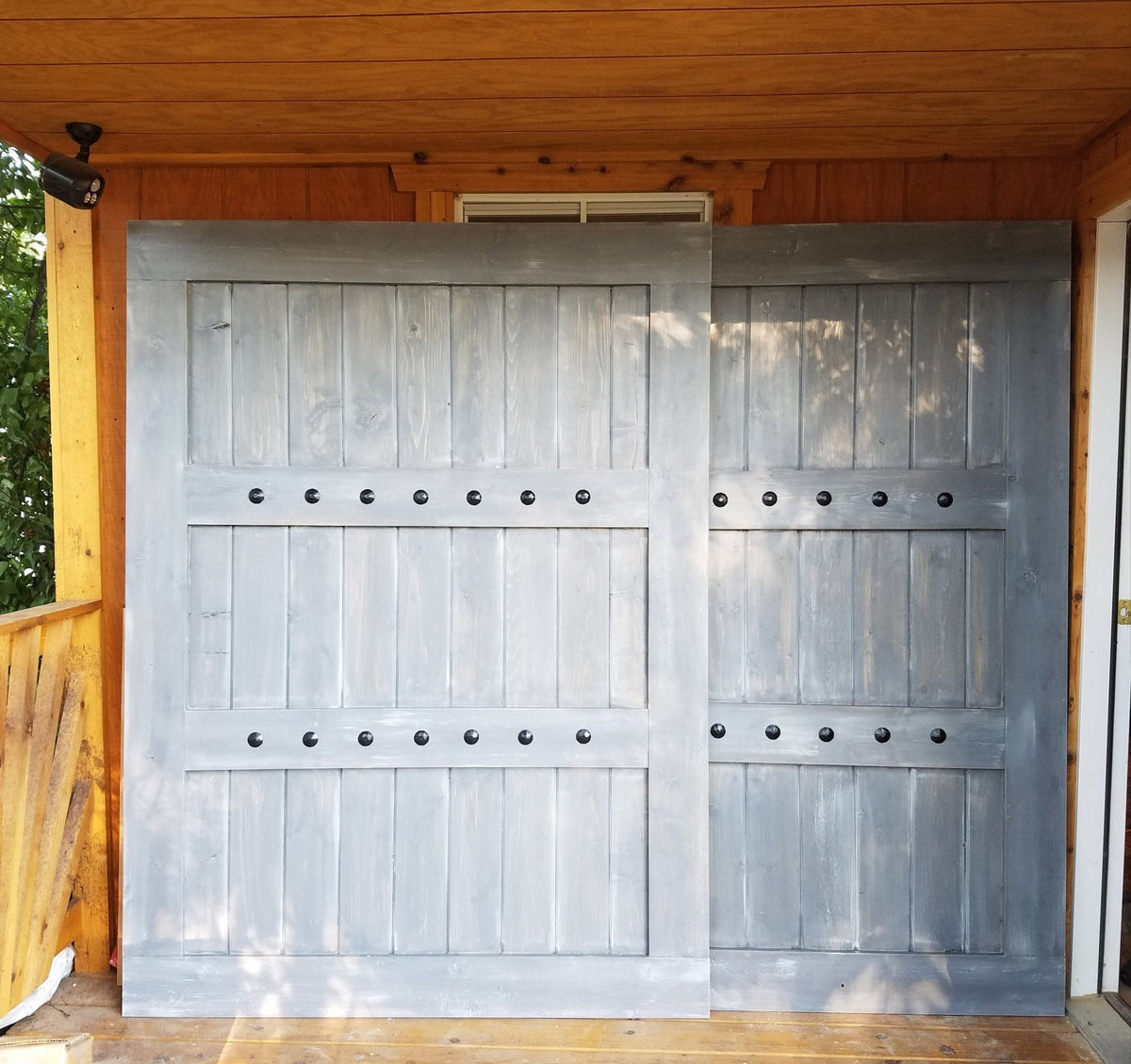 Custom wooden sliding shutter with a matching frame